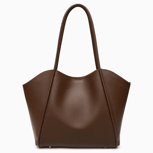 Women's handbag flat lay product photo before AI processing