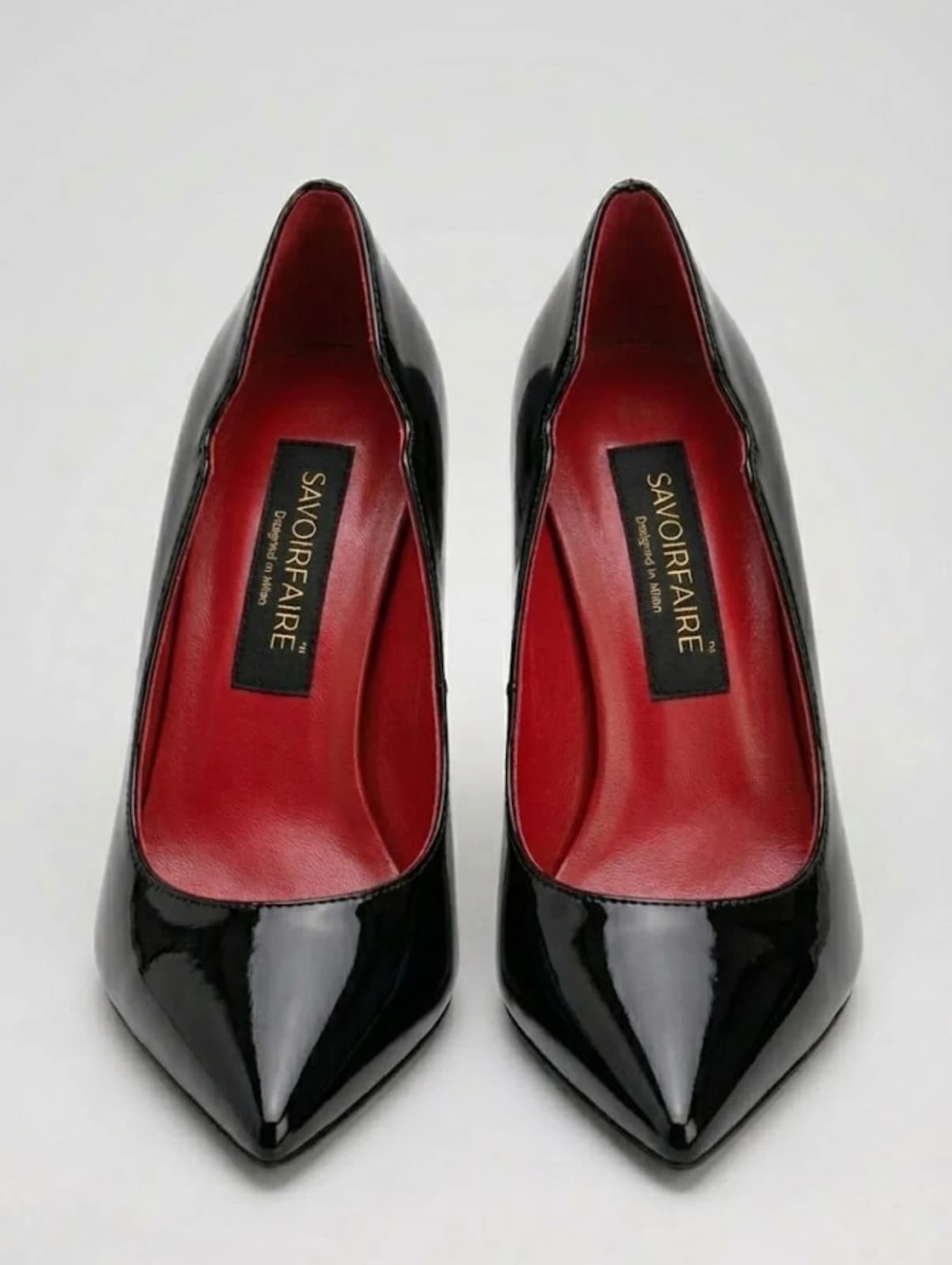 Black heels editorial product shot