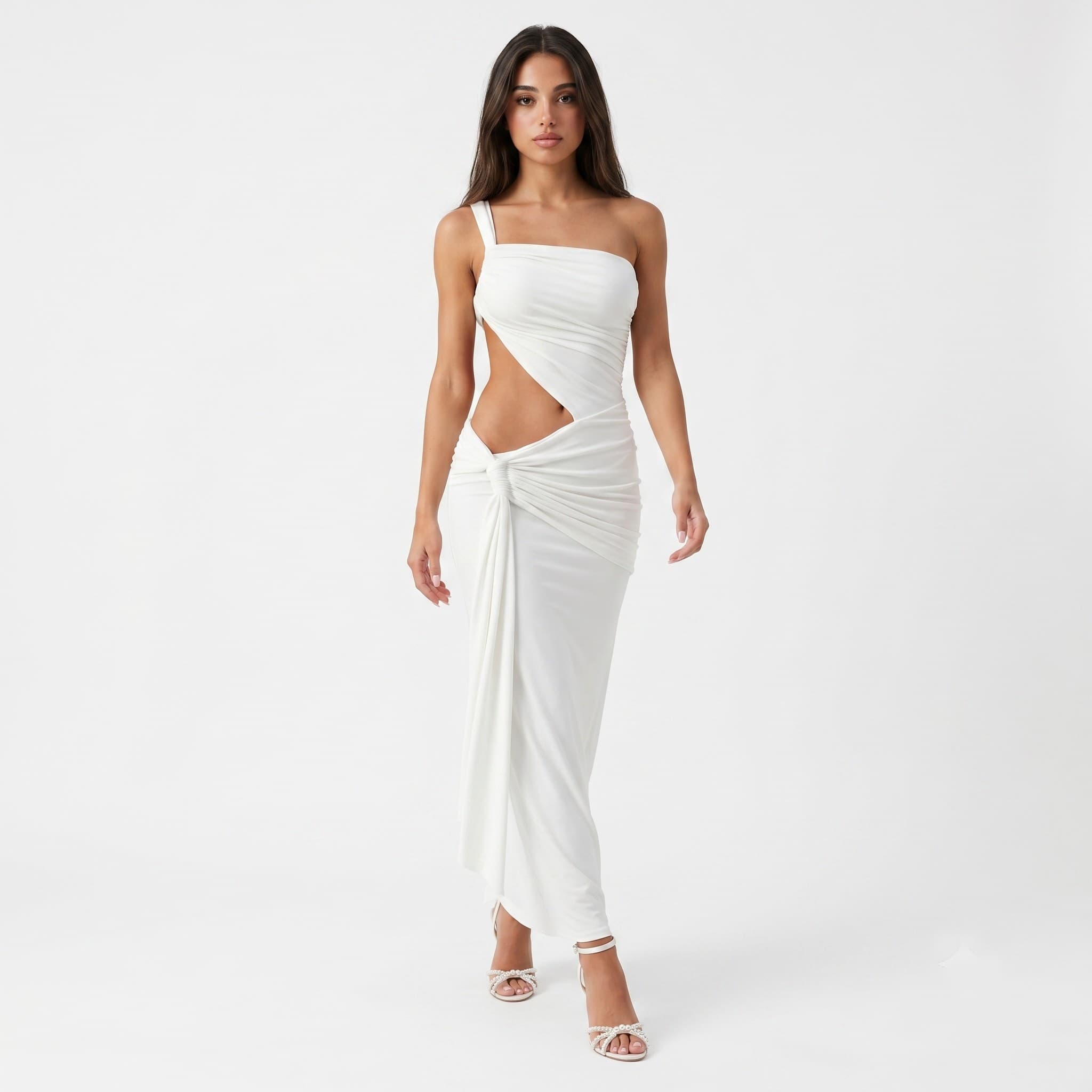 Woman in white one shoulder cutout maxi dress, front pose